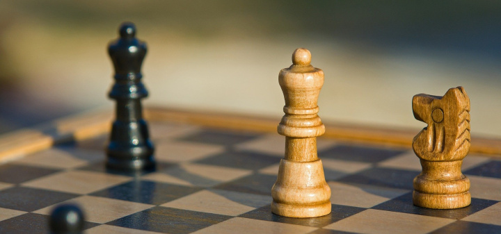 Chess is a game for businessmen | Chessboard and pieces